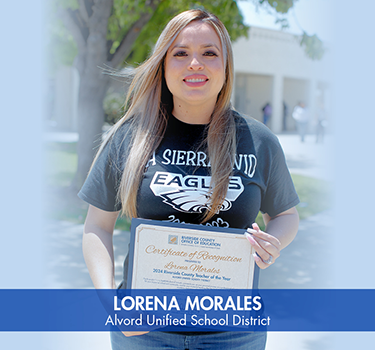 Lorena Morales, Alvord Unified School District standing on campus holding certificate