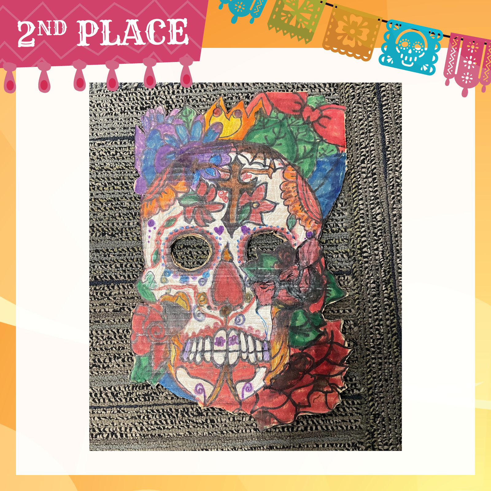 Ornately colored skull mask in marker and crayon