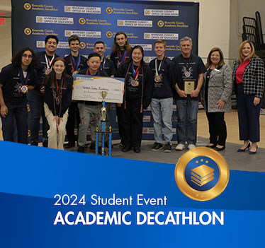 2024 Student Event. Academic Decathlon. Team and coach holding oversized check