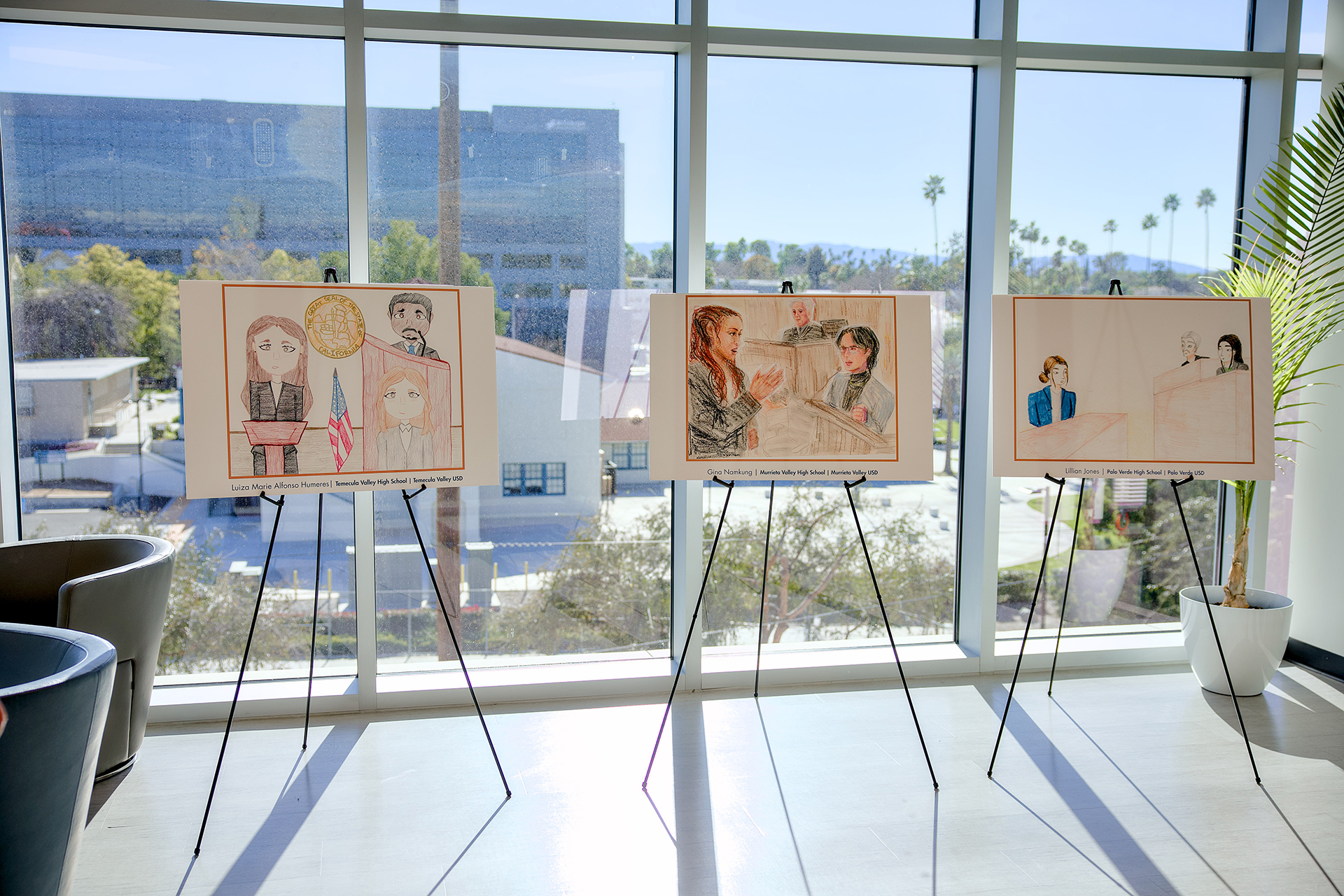 Three works by courtroom artists on display