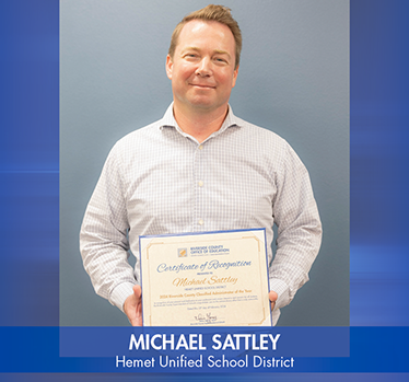 Michael Sattley Hemet Unified School District holding Classified Administrator of the Year certificate