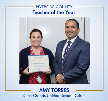 Riverside County Teacher of the Year, Amy Torres. Desert Sands Unified School District. Amy standing holding certificate with Dr. Gomez