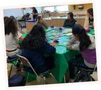 Group of young women working on art project