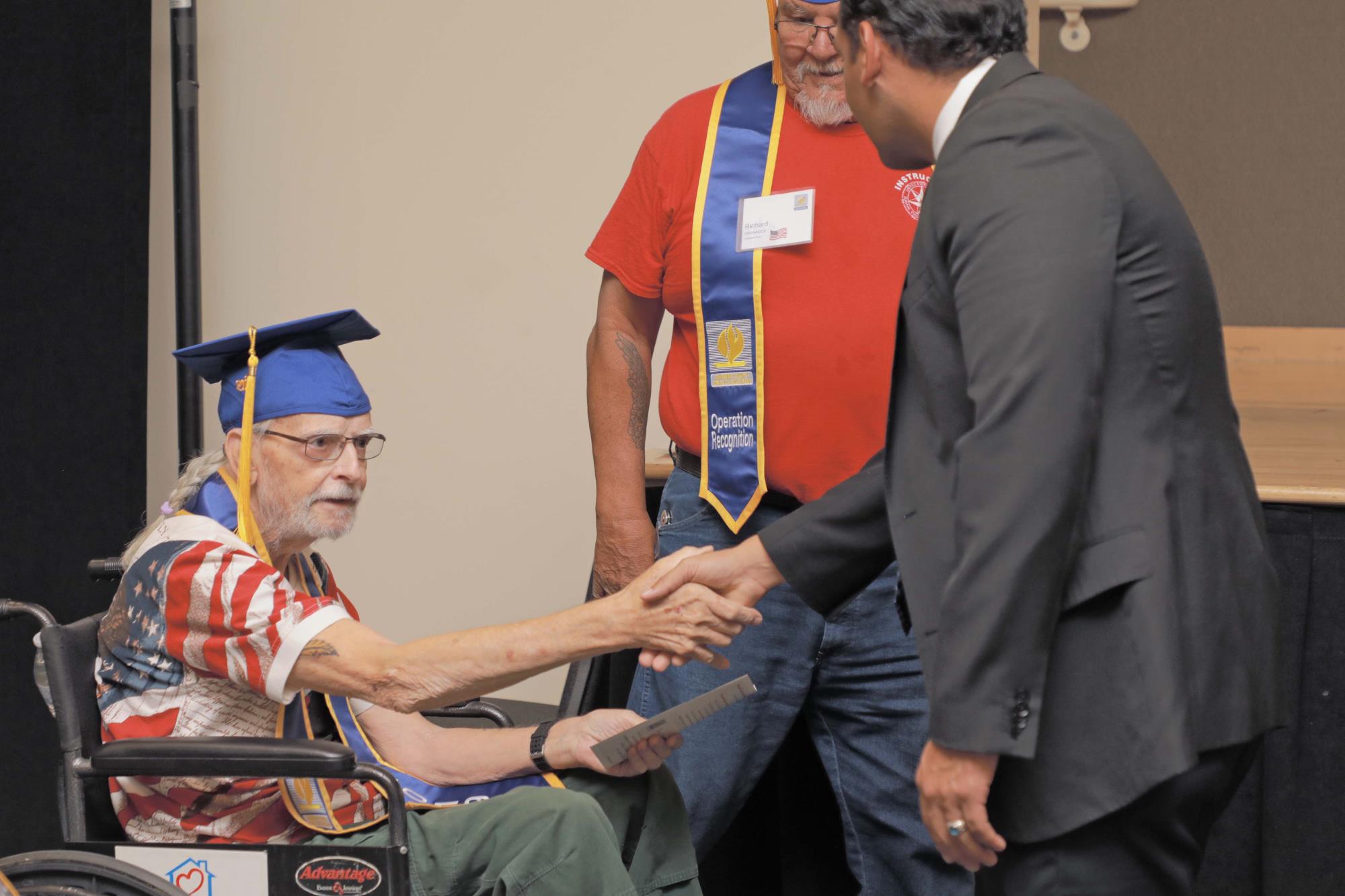 Veteran Franklin Stevens shakes hand with Dr. Gomez