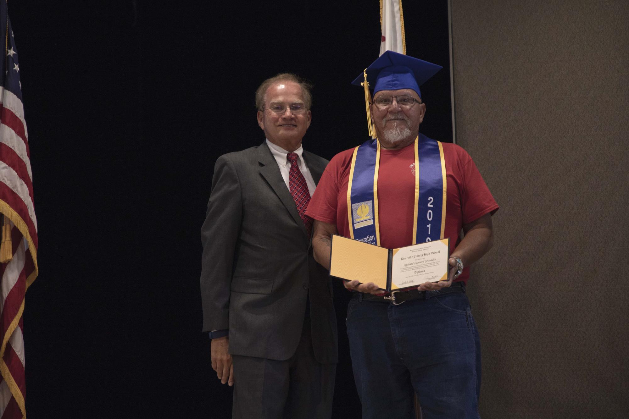 Richard Granados receives his diploma