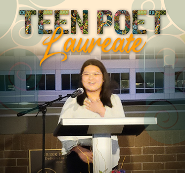 Teen Poet Laureate smiles standing at a podium